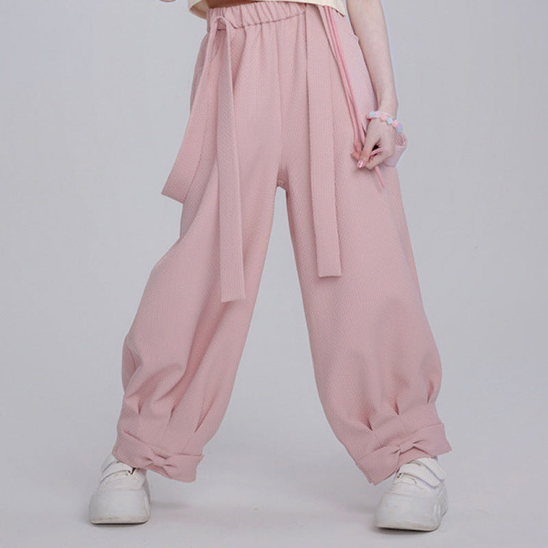 Woman's Baggy Pink Cargo Pants With Bows